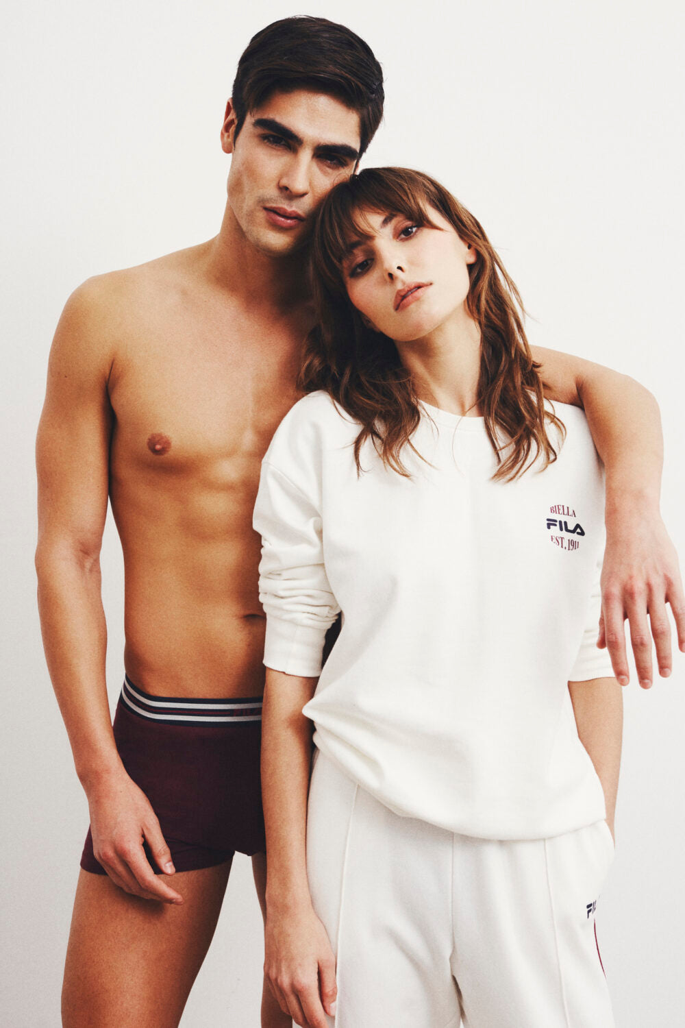 TUTA DONNA IN COTONE FELPATO CON PANTALONE A GAMBA AMPIA E BANDE LATERALI FILA