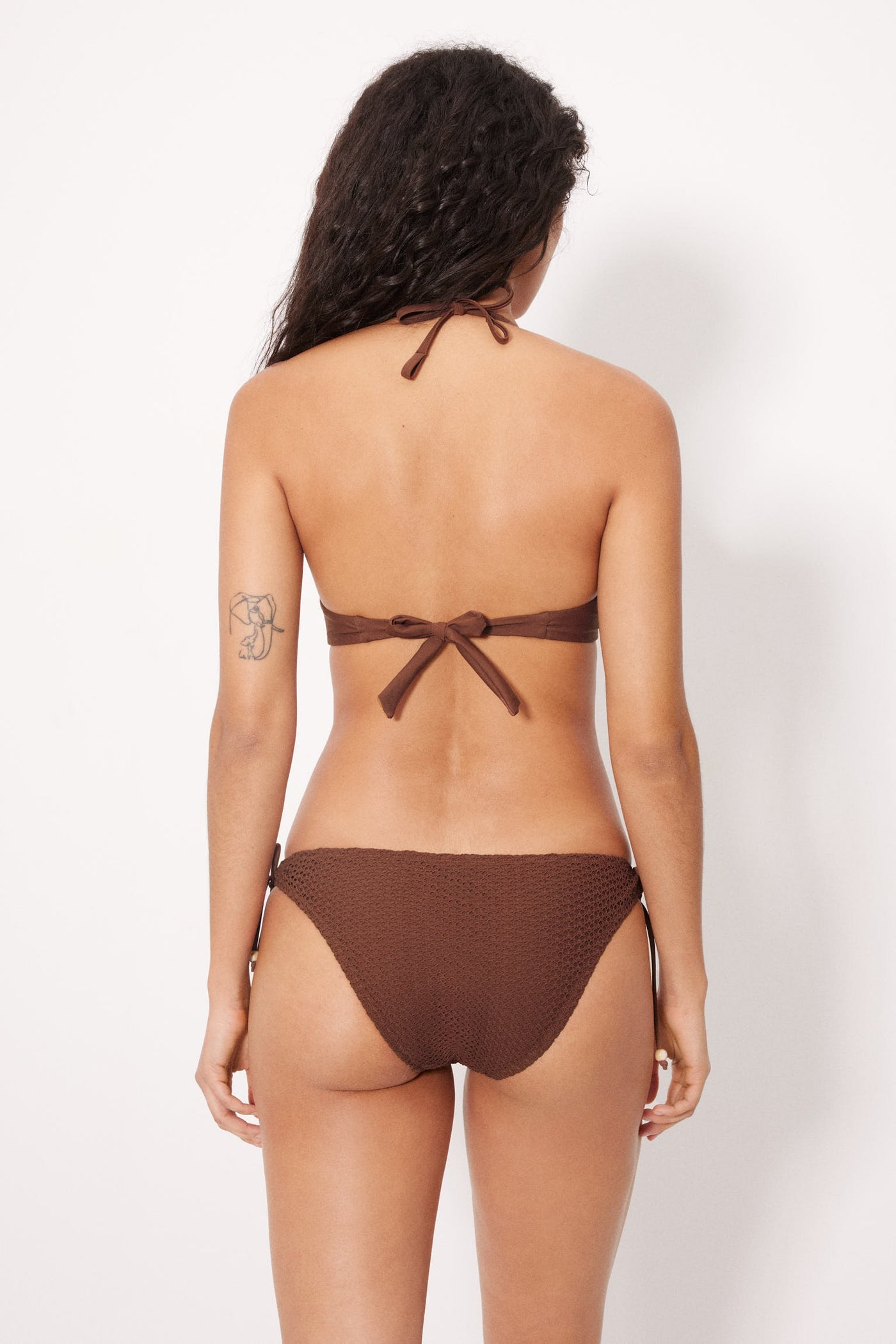 SLIP BIKINI CON LACCETTI TRAFORATO MARRONE YSABEL MORA