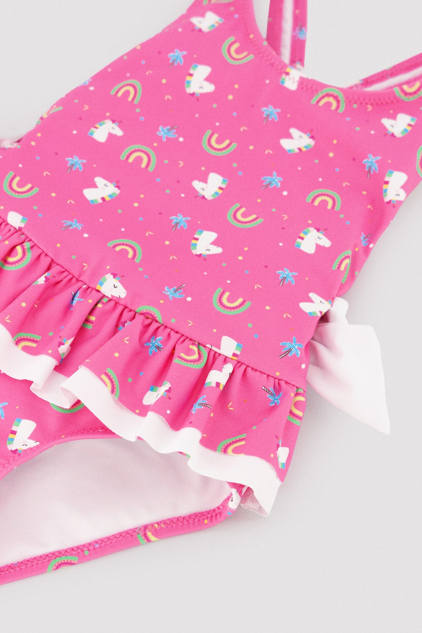 COSTUME INTERO BAMBINA ROSA CON STAMPA UNICORNI E ARCOBALENI YSABEL MORA