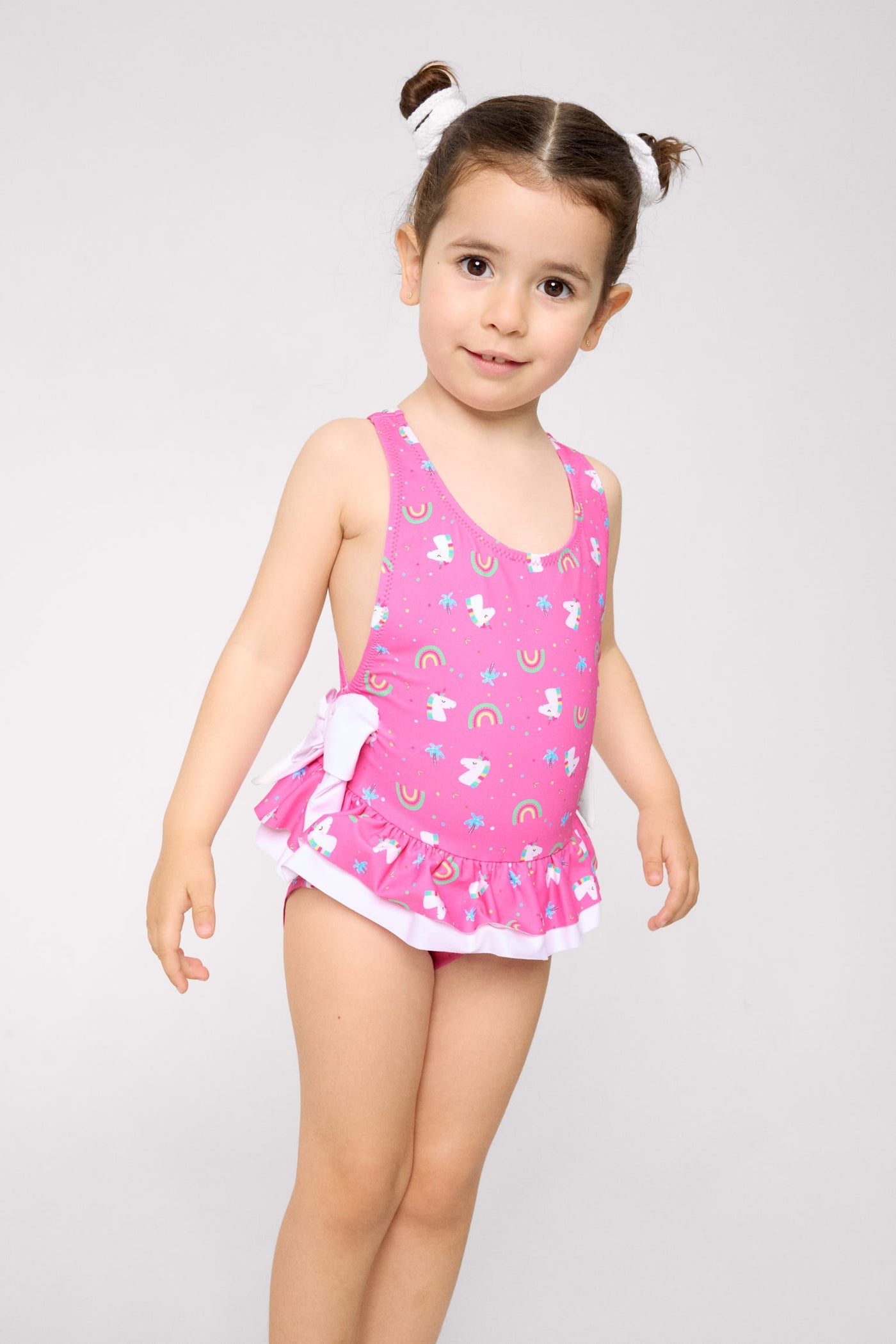 COSTUME INTERO BAMBINA ROSA CON STAMPA UNICORNI E ARCOBALENI YSABEL MORA