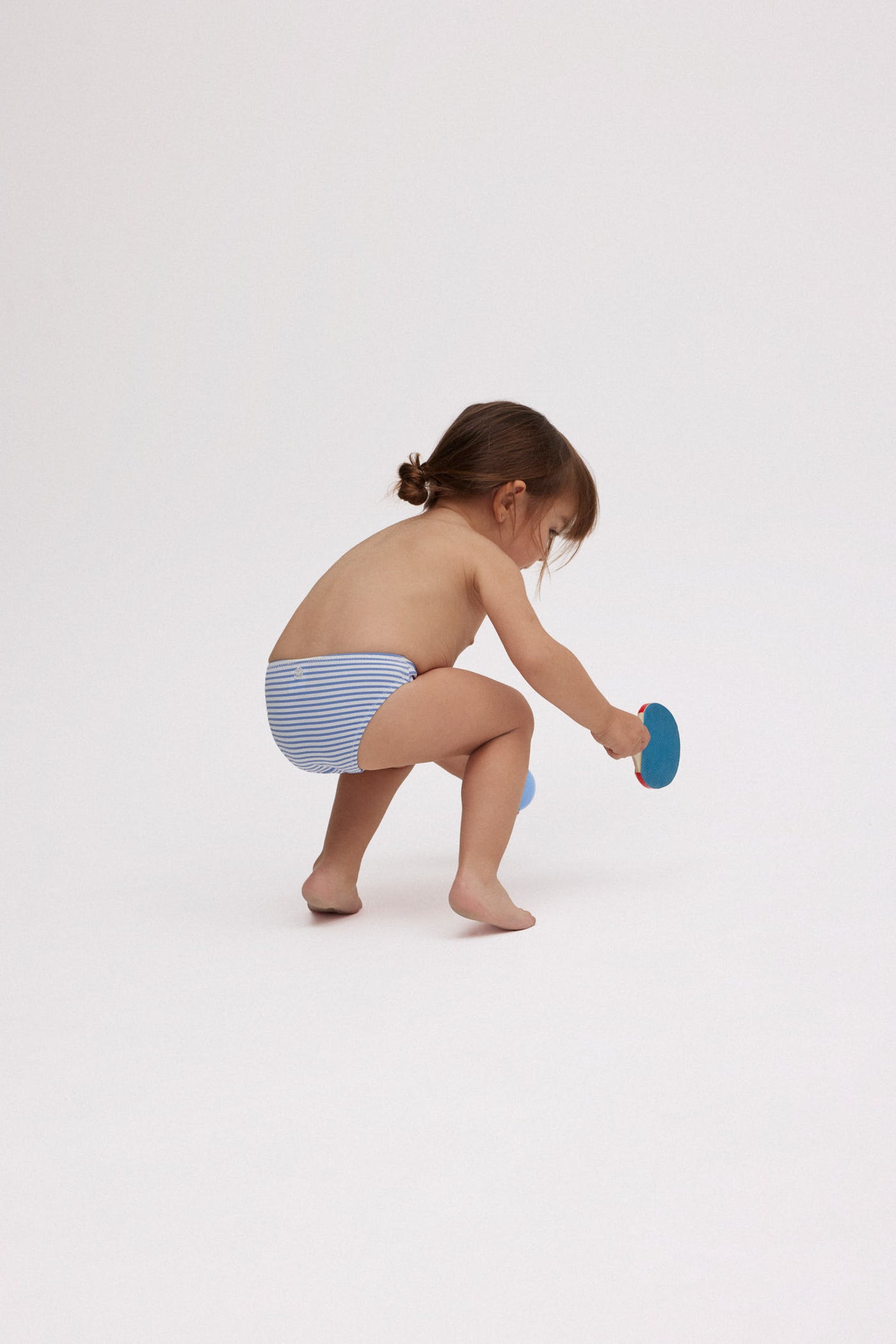 SLIP BIKINI BIMBA CON STAMPA A RIGHE YSABEL MORA