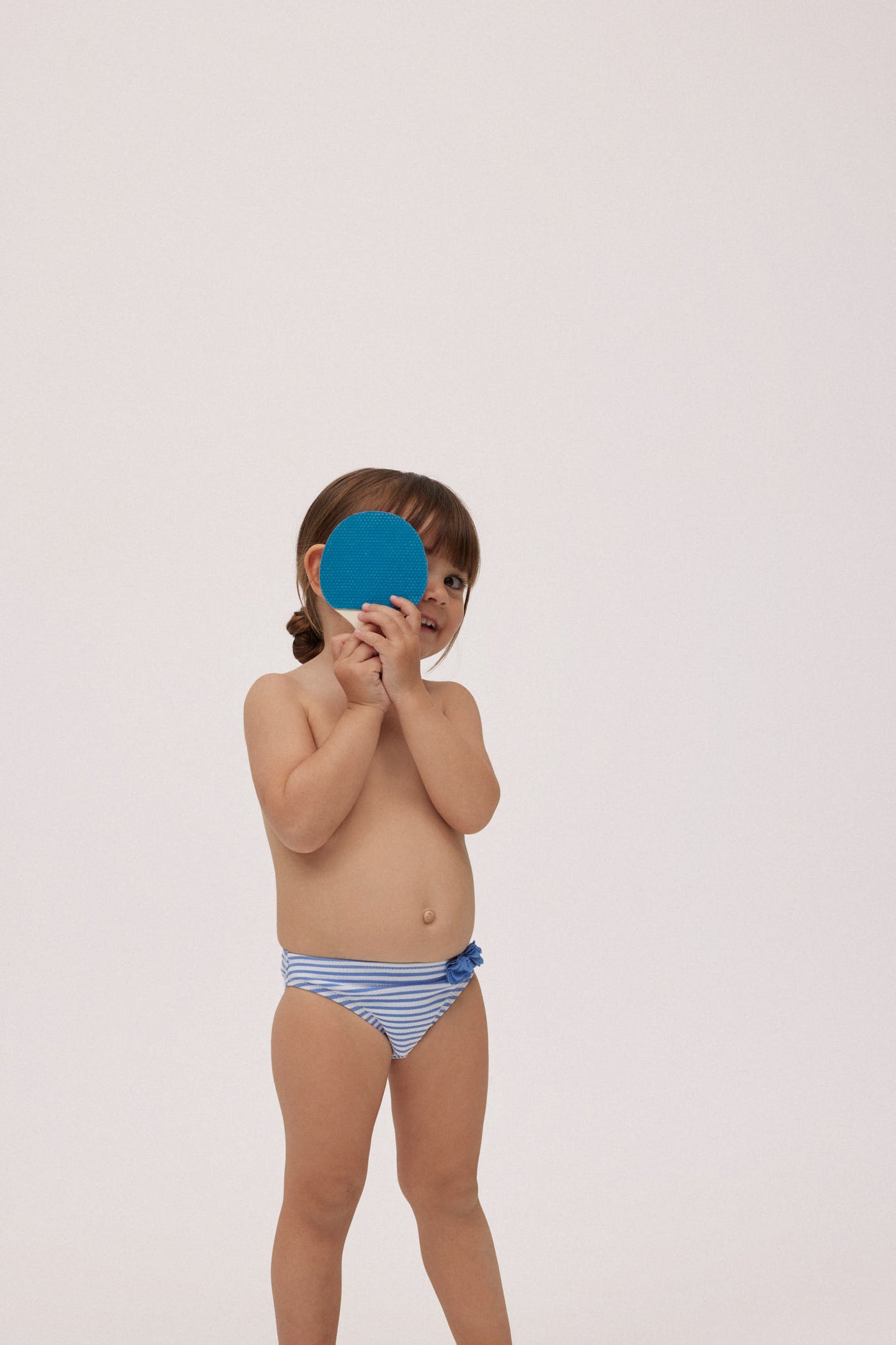 SLIP BIKINI BIMBA CON STAMPA A RIGHE YSABEL MORA