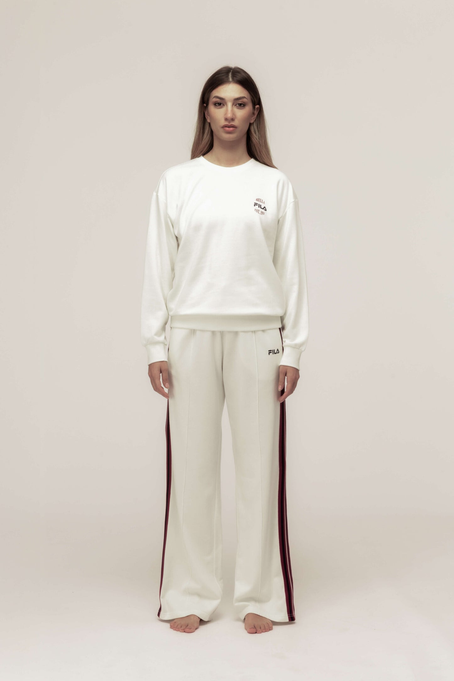 TUTA DONNA IN COTONE FELPATO CON PANTALONE A GAMBA AMPIA E BANDE LATERALI FILA